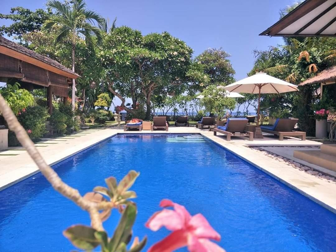 Frangipani Beach Hotel Lovina Quarto foto